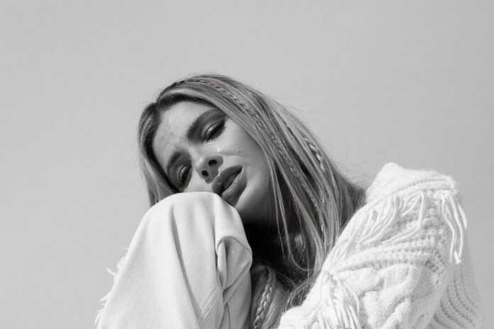 Photo by China suarez on June 22, 2023. May be a black-and-white image of 1 person, makeup, hair, turtleneck, sweater and text.
