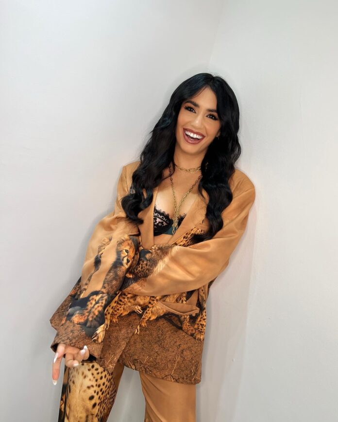 Photo shared by LALI on May 31, 2023 tagging @madness_clothing. May be an image of 1 person, makeup and text. (1)
